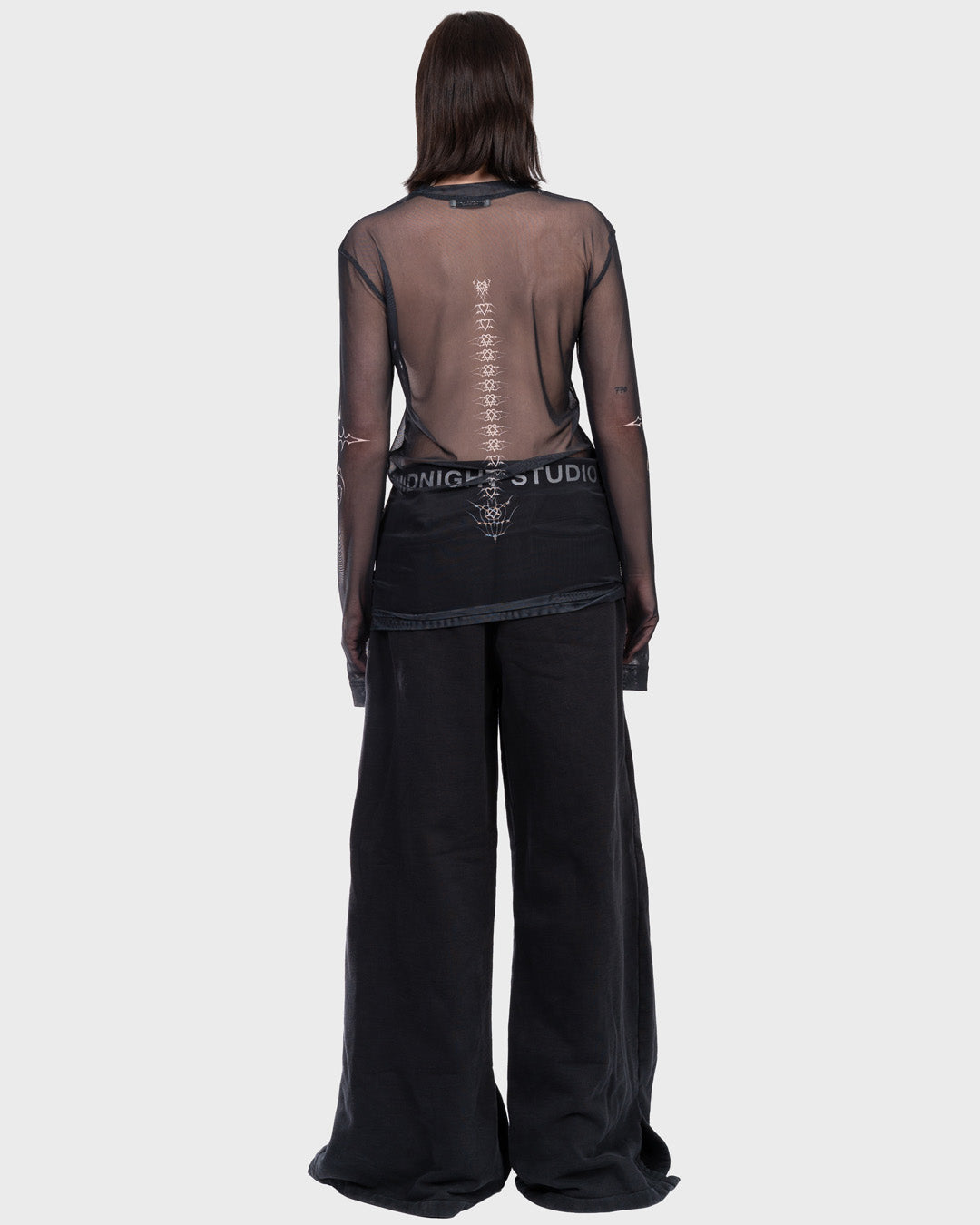 Tattoo Mesh Shirt in Black. Back Angle.