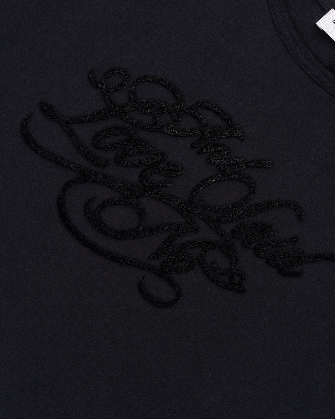 Love Said No Layered T-Shirt in Black. Front detail shot.