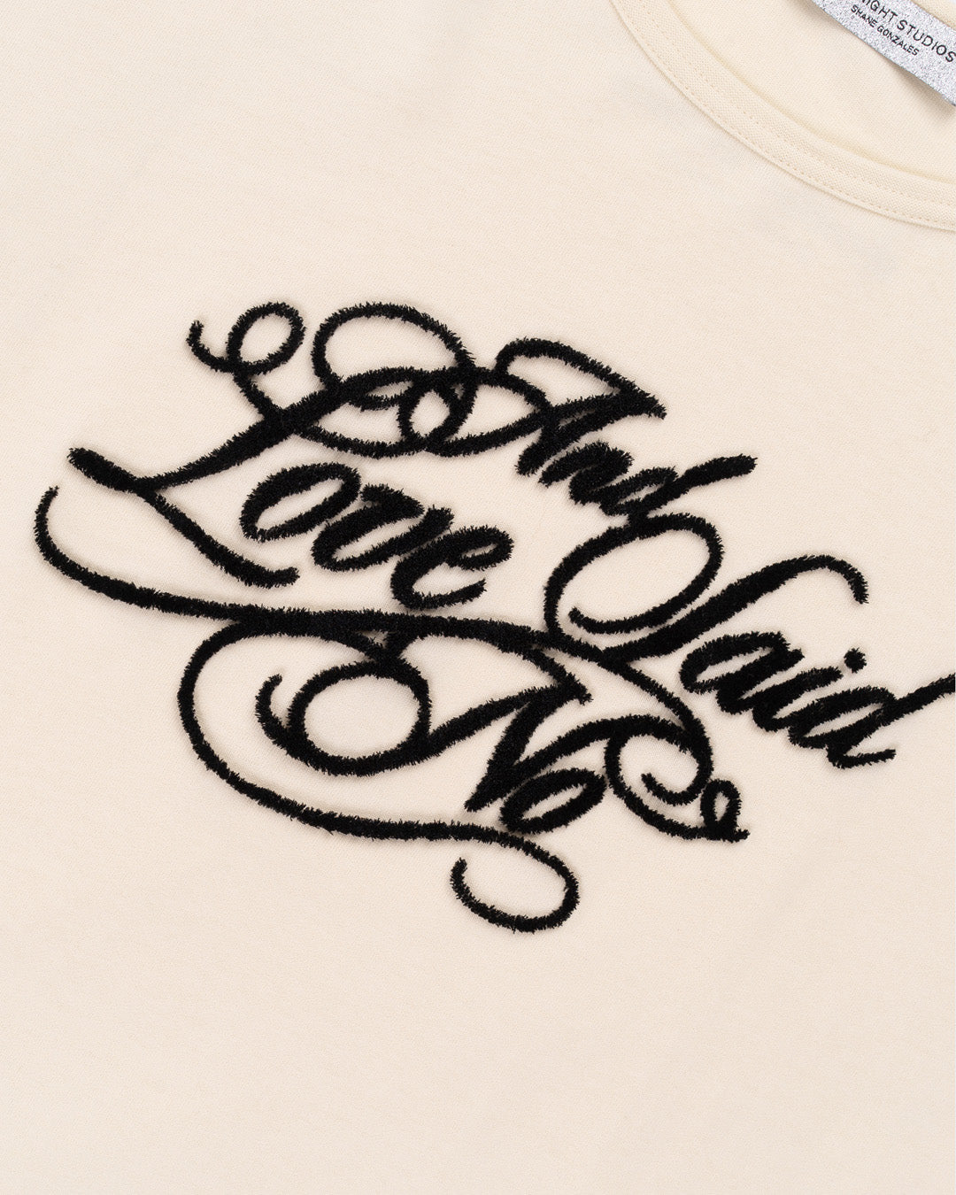 Love Said No Layered T-Shirt in Pearl. Front detail shot.