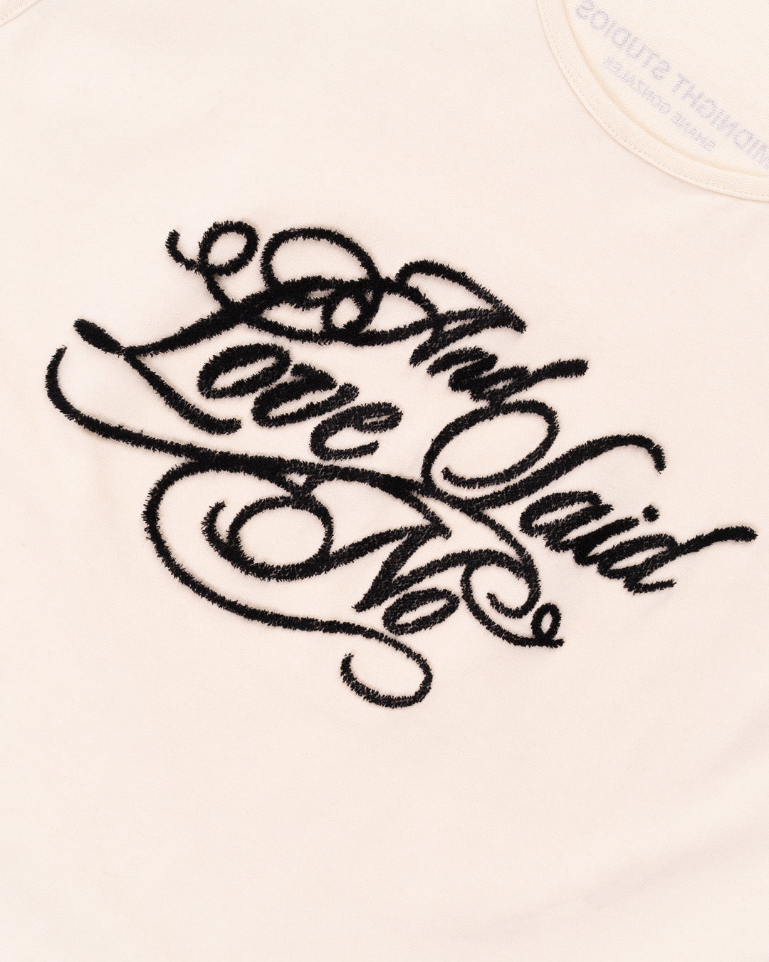 Love Said No Tank Top in Pearl. Front detail shot.